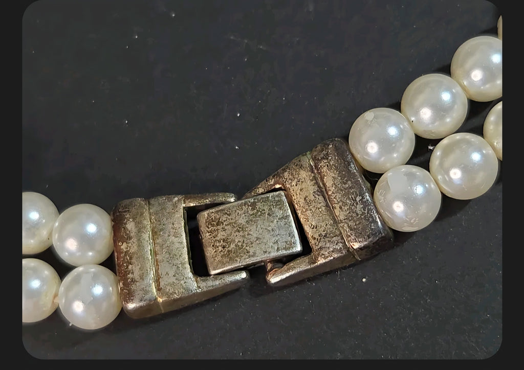 Oddly Darling Vintage double-strand cream faux pearl necklace featuring a secure metal box clasp closure