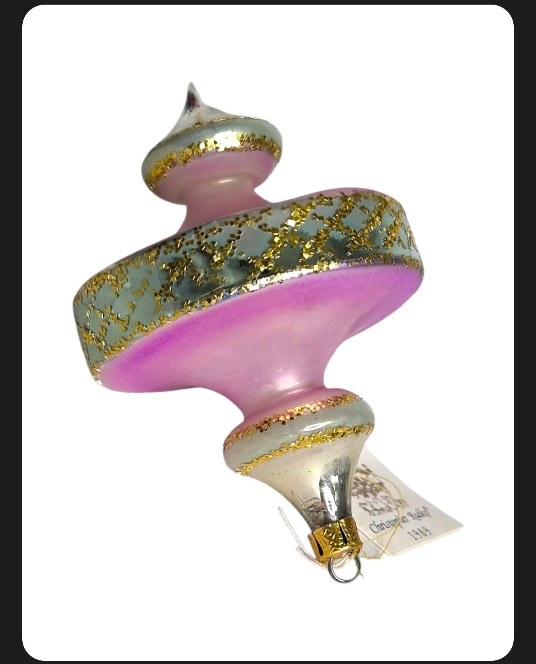 Oddly Darling Vintage 1989 Christopher Radko glass Christmas ornament in pink with silver and gold glitter accents.