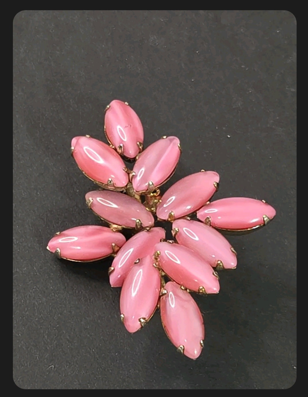 Oddly Darling Vintage marquise-cut pastel pink cabochon stone cluster brooch in a gold-tone metal floral setting.