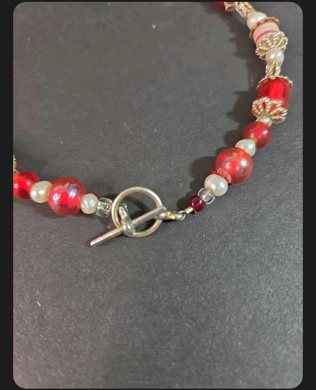 Oddly Darling Vintage beaded statement necklace featuring crimson red glass beads, white pearls, and gold filigree.