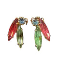 Oddly Darling Vintage gold-tone clip-on earrings featuring marquise-cut ruby red, emerald green, and blue crystals.