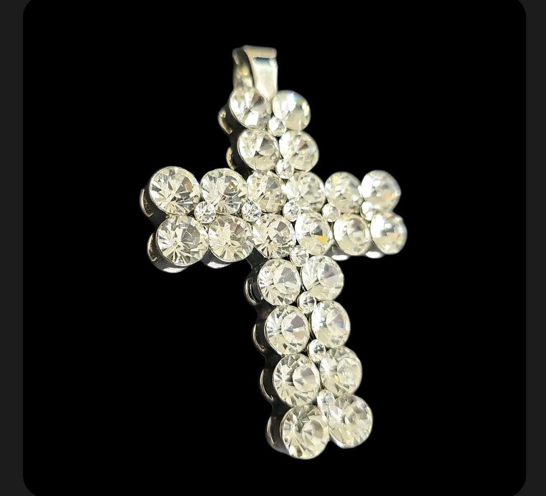 Oddly Darling Vintage silver-tone cross pendant encrusted with sparkling clear rhinestones on a black background
