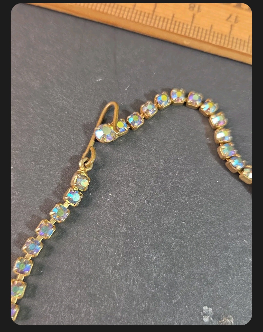 Oddly Darling Vintage gold-tone rhinestone necklace with iridescent crystals and a secure hook-and-eye clasp.