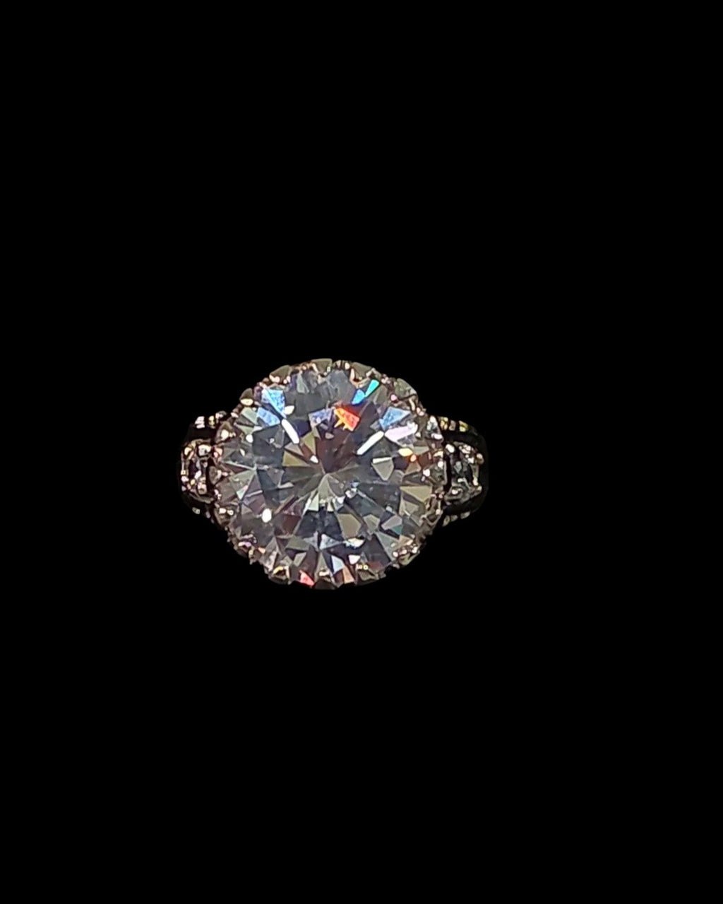 Oddly Darling Vintage silver-tone cocktail ring featuring a large brilliant-cut central stone and filigree detailing.