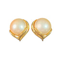 Oddly Darling Vintage Trifari clip-on earrings featuring a large faux pearl set in polished gold-tone leaf metal.