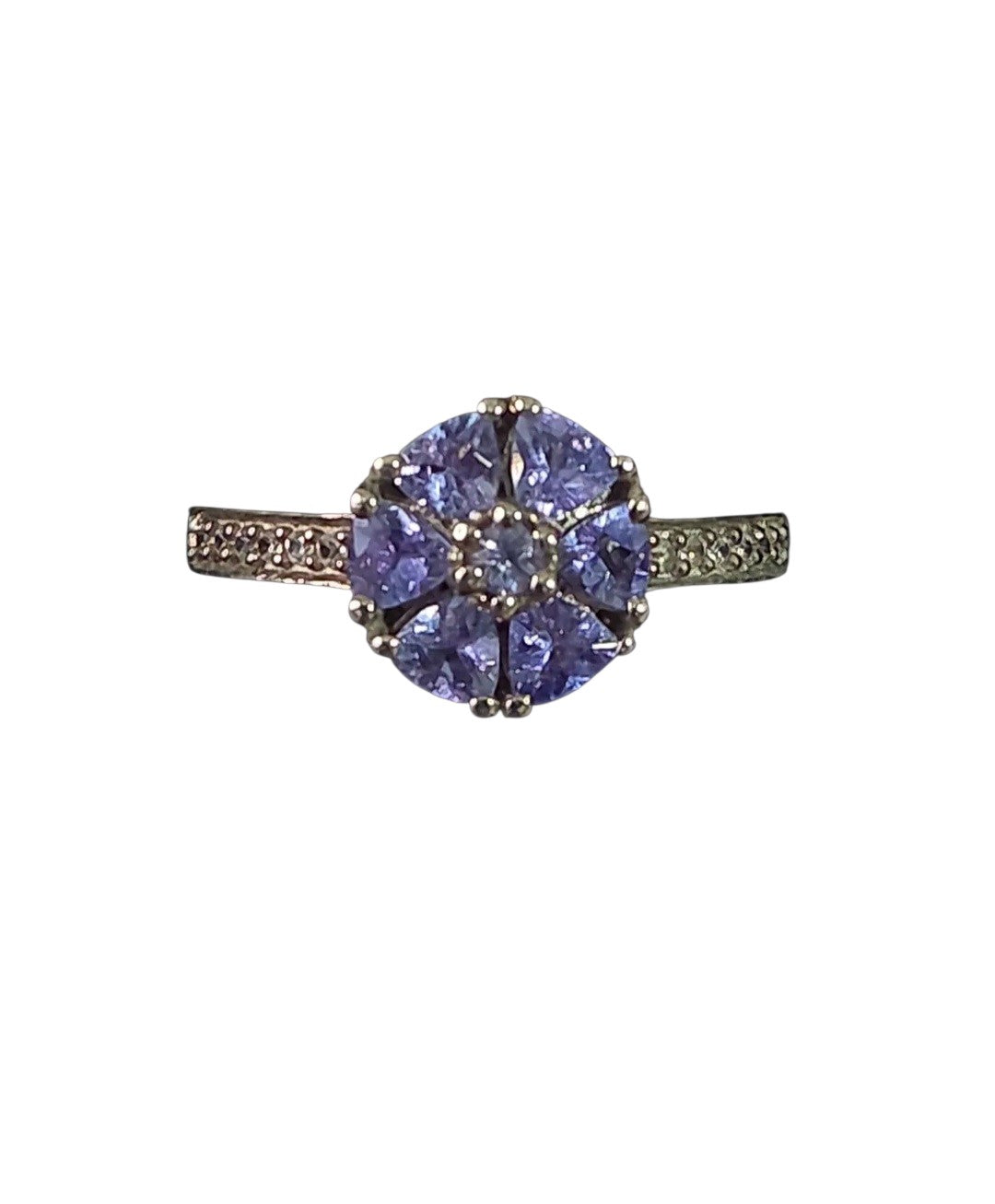Oddly Darling Vintage floral cluster ring featuring violet gemstones in a flower motif with shimmering accent stones.
