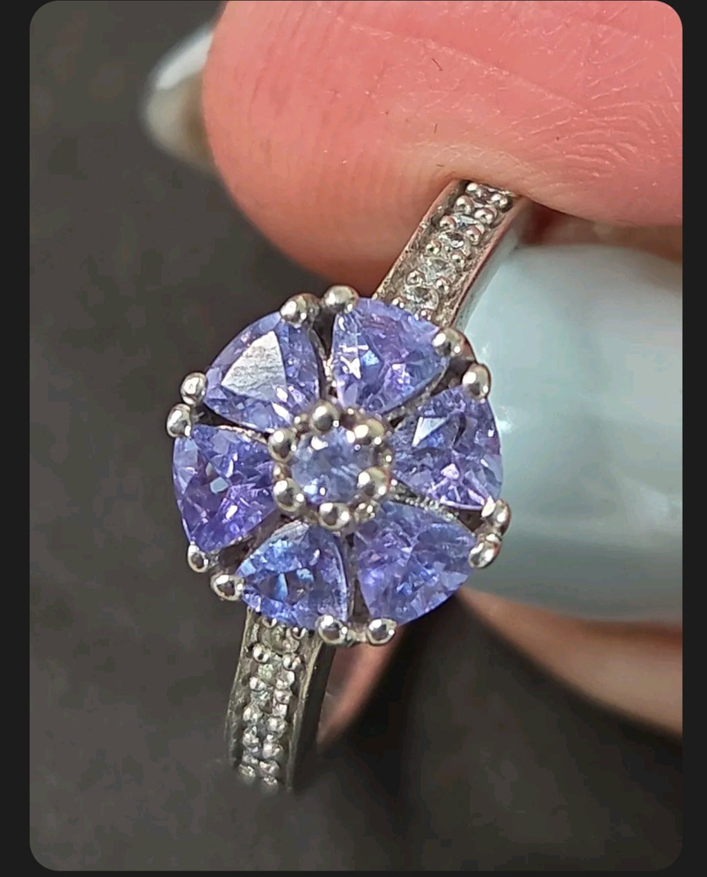 Oddly Darling Vintage floral cluster ring featuring violet faceted gemstones in a flower motif with accent stones