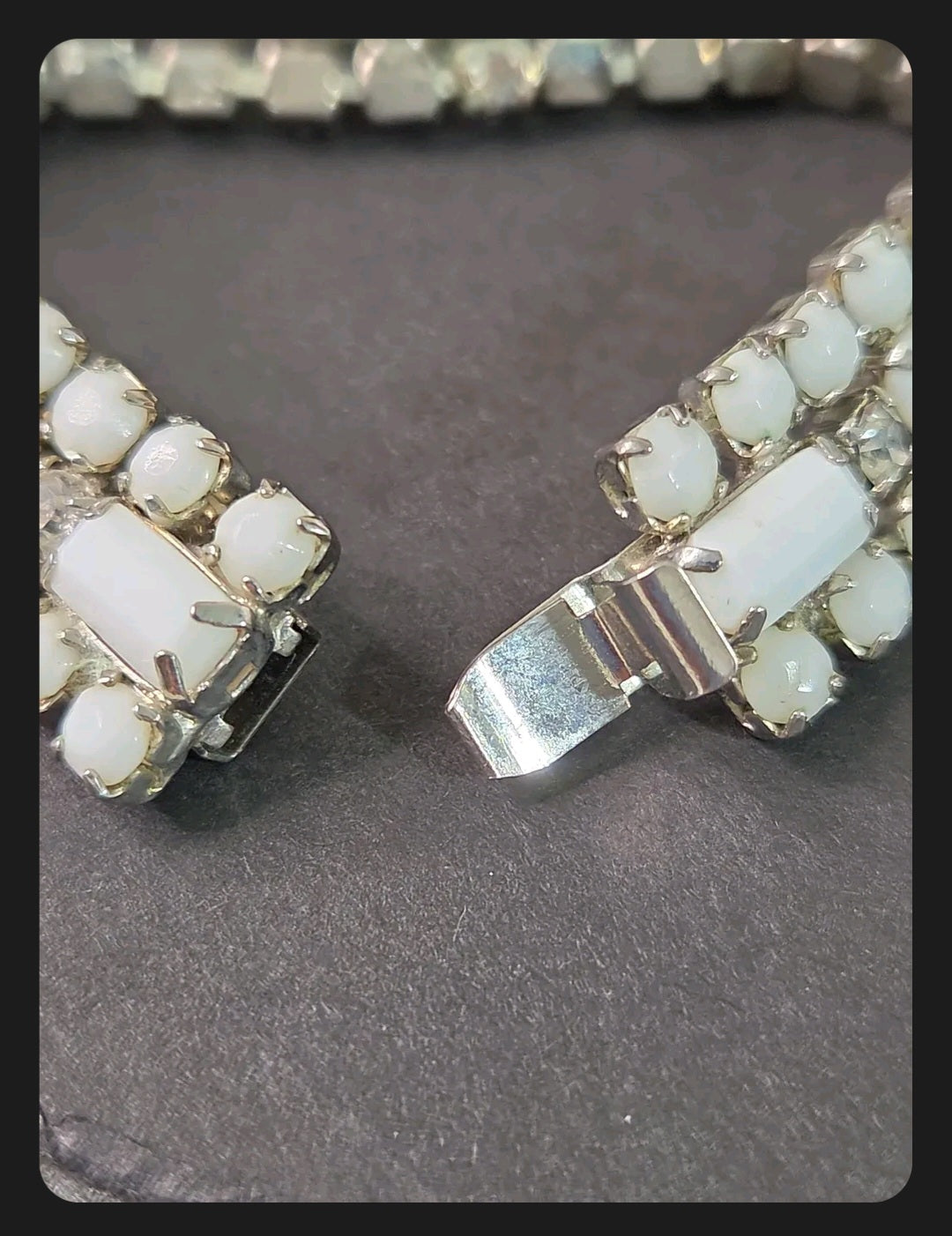 Oddly Darling Vintage multi-strand bracelet featuring milky white cabochon stones and clear crystals in silver-tone