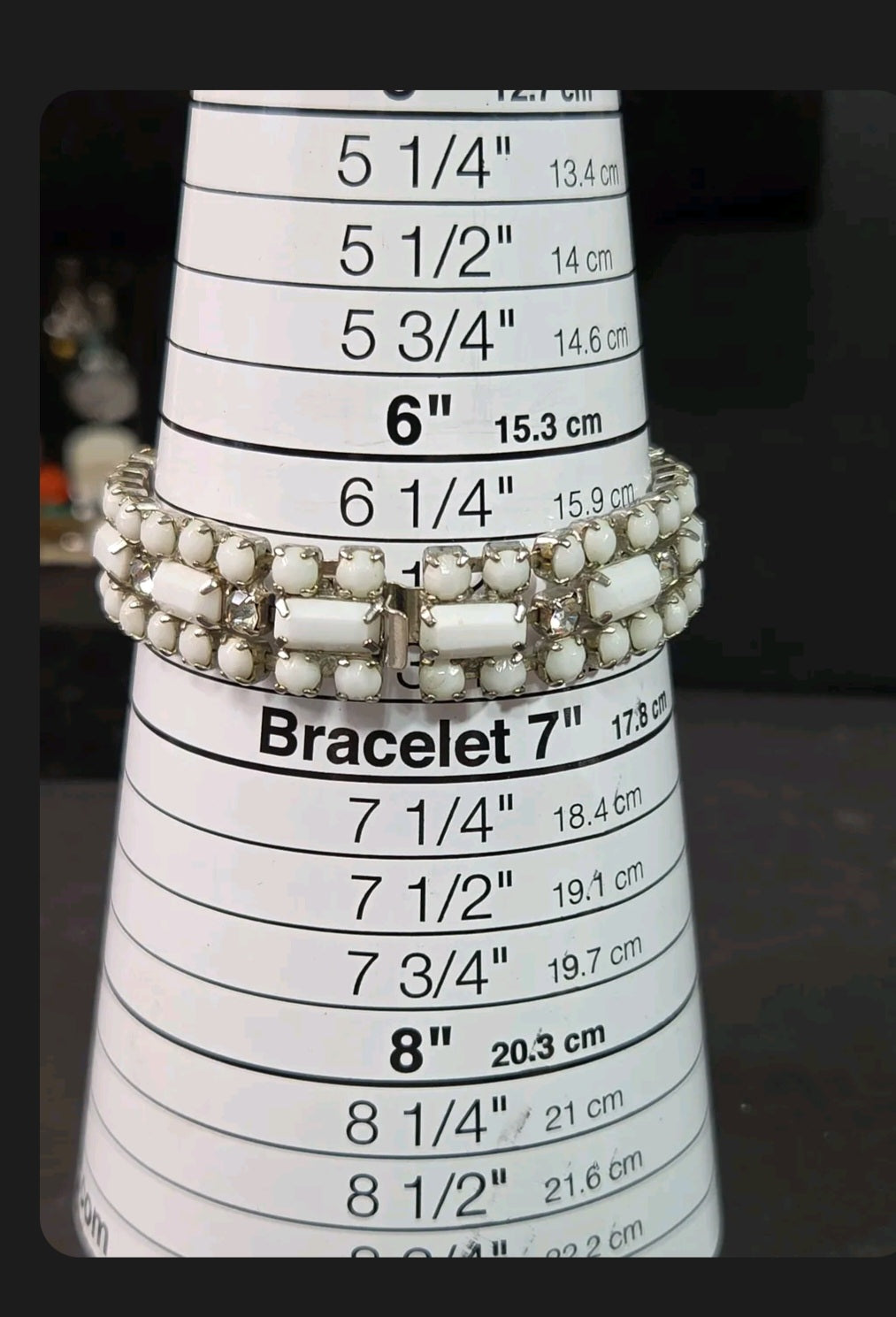 Oddly Darling Vintage multi-strand bracelet with milky white cabochons and clear crystals on a silver-tone mandrel.